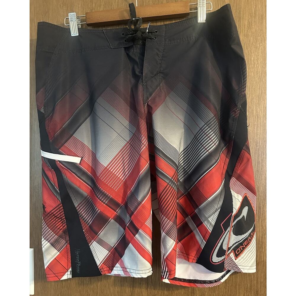 O'Neill SuperFreak plaid red board shorts size 33 unlined swim beach surf
